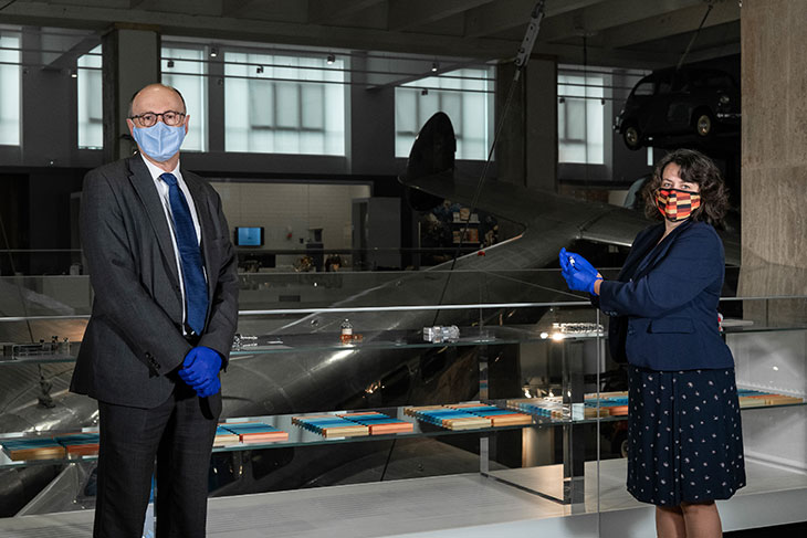 Professor Stephen Powis, National Medical Director of NHS England and Natasha McEnroe, Keeper of Medicine at the Science Museum, with the first vial of the Covid-19 vaccine.