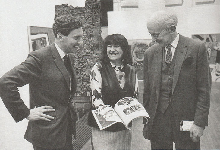 Alan Bowness (left) with Alison Smithson and Philip James during the installation of ‘Painting & Sculpture of a Decade: ’54-‘64' at the Tate Gallery, London, 1964. Credit: