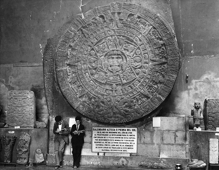 The Aztec sun stone at the Museo Nacional de Antropología in Mexico City, photographed in c. 1930.