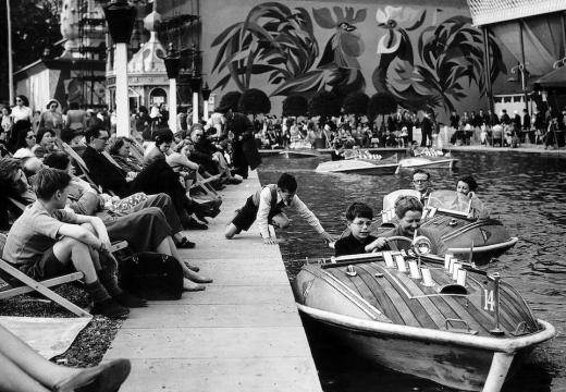 Children on the boating lake in Battersea Gardens at the Festival of Britain in 1951.