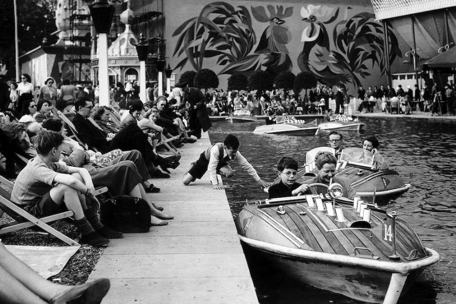 Children on the boating lake in Battersea Gardens at the Festival of Britain in 1951.