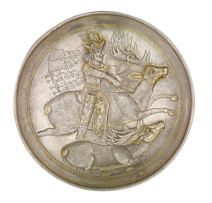 Plate with king with the crown of Shabuhr II slaying a stag (c. late 4th century), Sasanian, Iran. British Museum, London