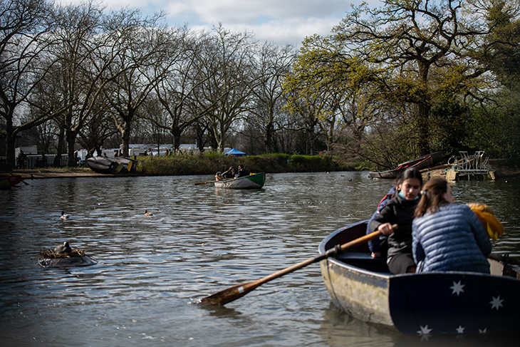 Boaters on the lake in Finsbury Park, 2 April 2021. Photo: Chris J Ratcliffe/Getty Images