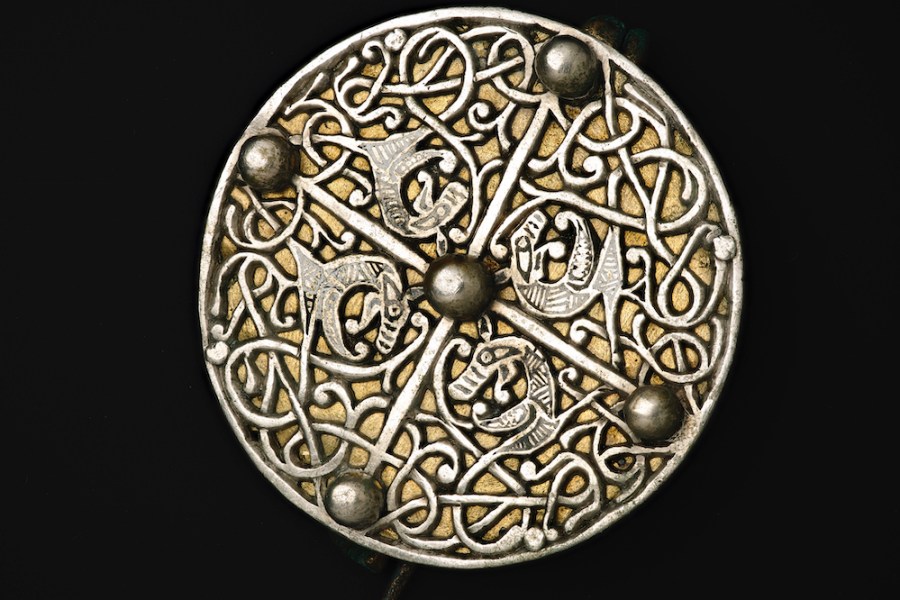 An Anglo-Saxon disc brooch.