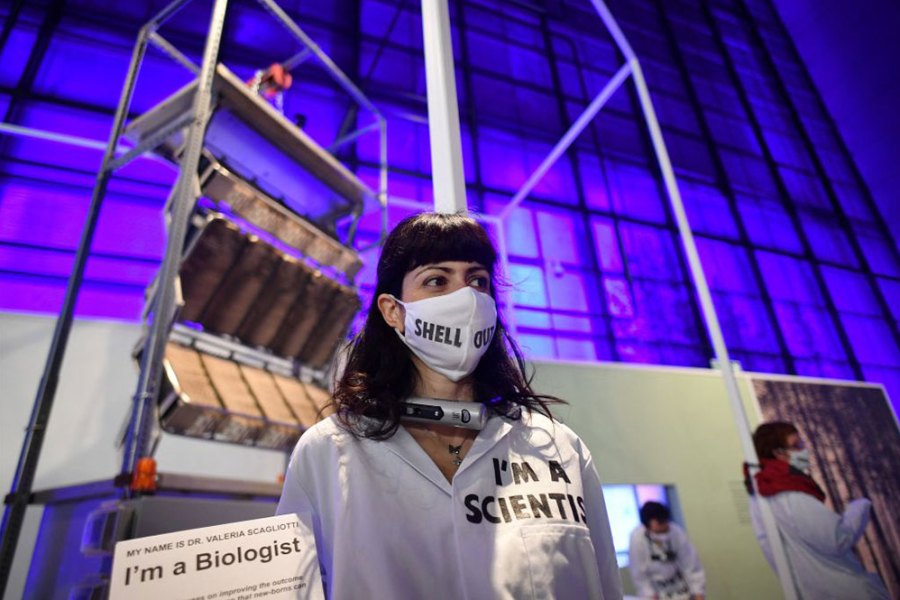 Activists from Extinction Rebellion chained to an exhibit at the Science Museum’s 'Our Future Planet' exhibition, sponsored by Shell, in May 2021.