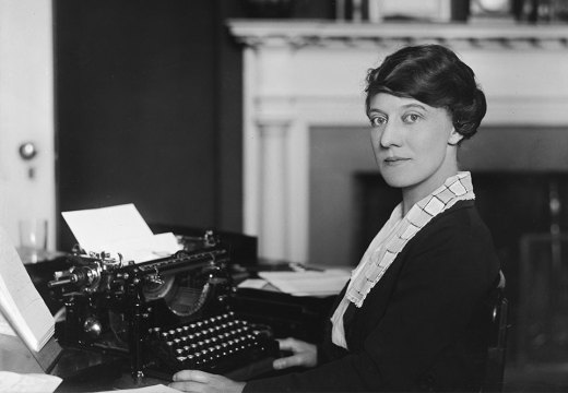 Woman working in an office in the United States, c. 1921.