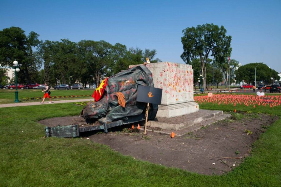 A toppled statue of Queen Victoria on the grounds of the Manitoba Legislature on 2 July, 2021 in Winnipeg, Manitoba, Canada. The statue was pulled down by indigenous protestors following a march to honour survivors and victims of Canada’s residential school system.