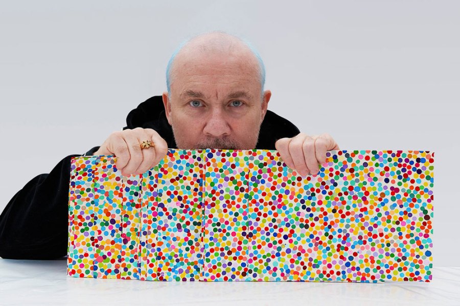 Blue rinse and repeat: Damien Hirst with The Currency artworks.