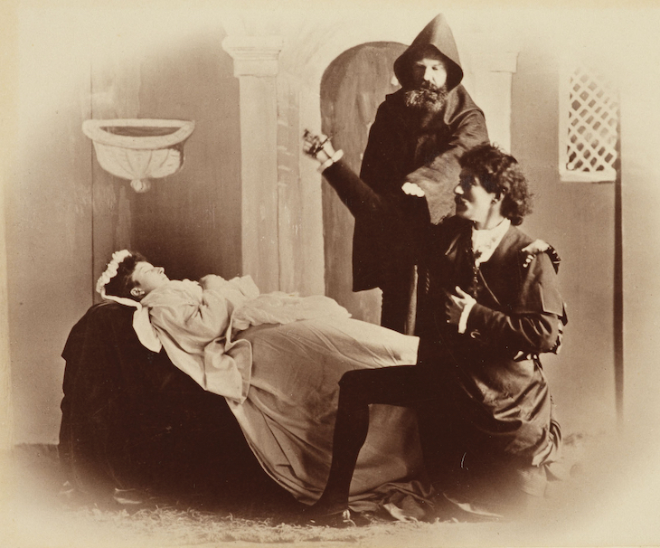 A tableau vivant at Balmoral depicting Romeo and Juliet, Act 5, Scene 3, in 1888. Princess Maud of Wales plays Juliet and Sir Fleetwood Edwards plays Romeo; photograph taken by Charles Albert Wilson. 