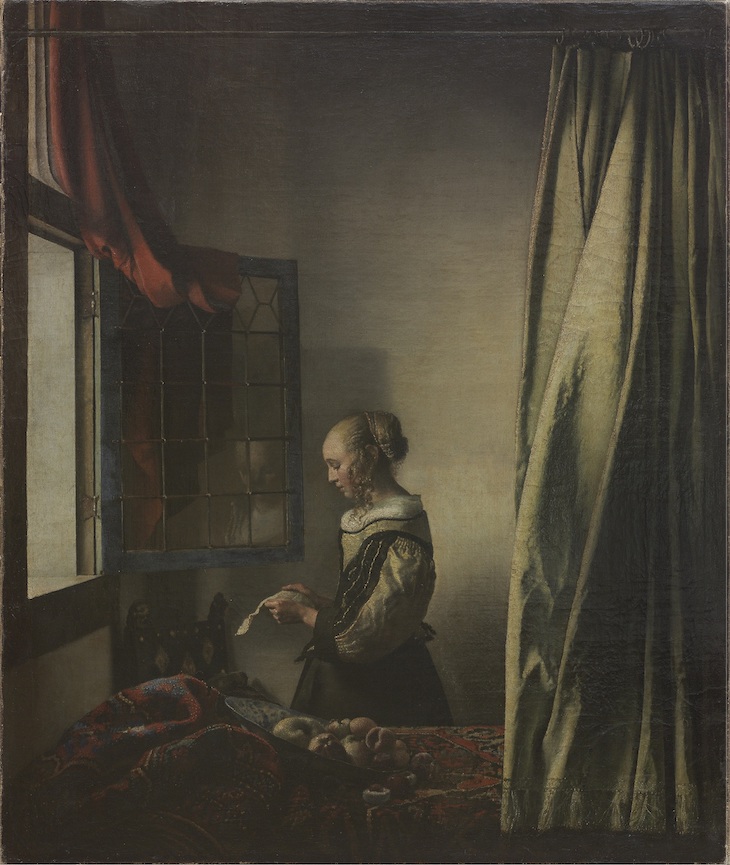 Girl Reading a Letter at the Open Window (before restoration; (1657–59), Johannes Vermeer.