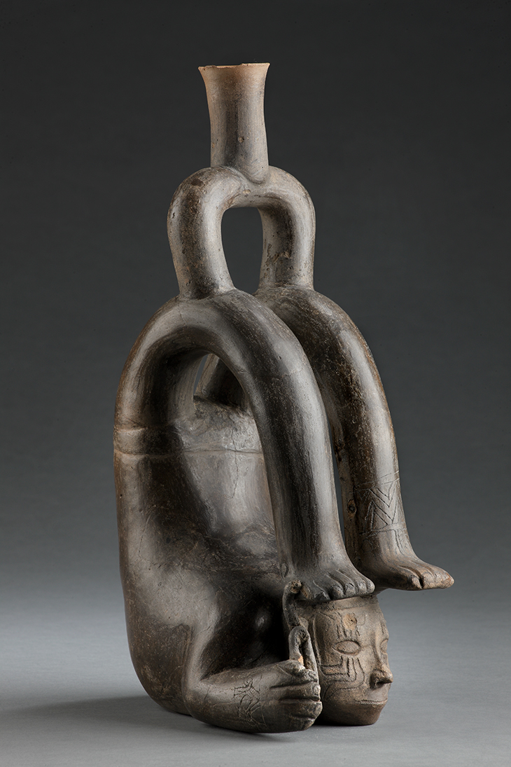 Pottery vessel in the shape of a contorted body (1200–500 BC), Cupinisque, Peru. 