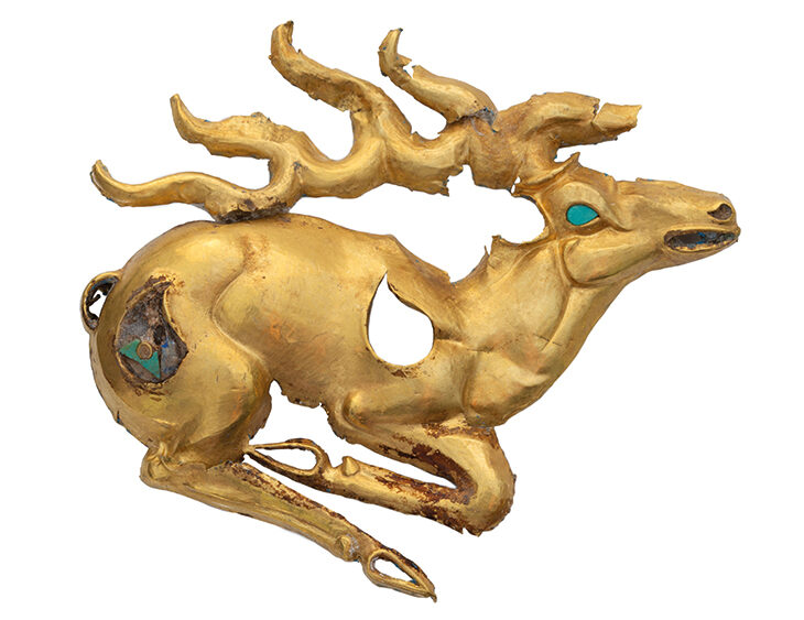 Gold recumbent stag plaque with inlays of turquoise and lapis lazuli (8th–6th century BC), discovered at the Eleke Sazy burial complex in Kazakhstan