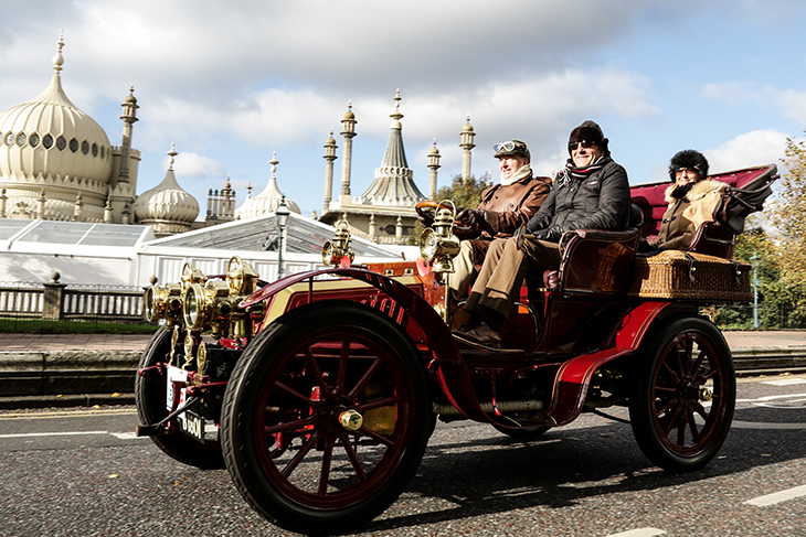 Participants driving past Brighton Pavilion in the London to Brighton Veteran Car Run