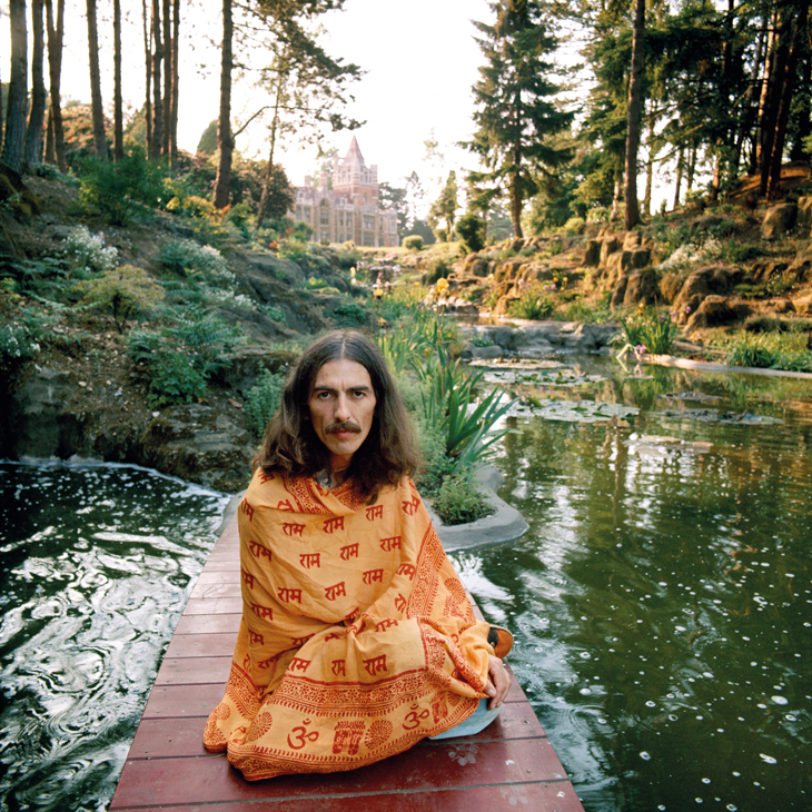 George Harrison photographed by Terry O’Neill in the grounds of Friar Park in Oxfordshire in 1975.