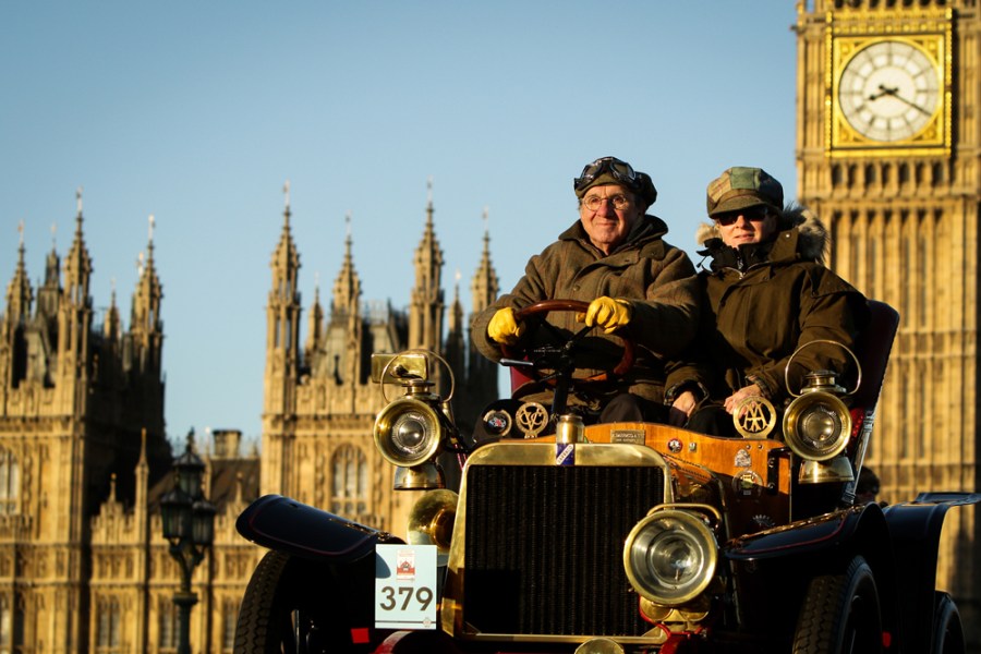 Participants driving over Westminster Bridge at the London to Brighton Veteran Car Run