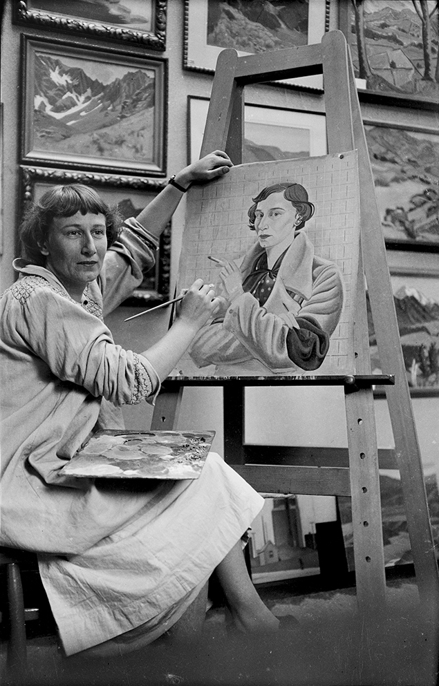 Rita Angus painting a self-portrait, photographed by Jean Bertram in 1936–37.