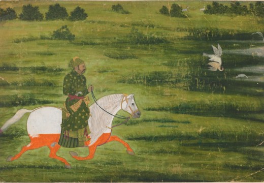A mounted man hunting birds with a falcon (early 18th century), Kishangarh, Rajasthan state, India, Mughal dynasty.