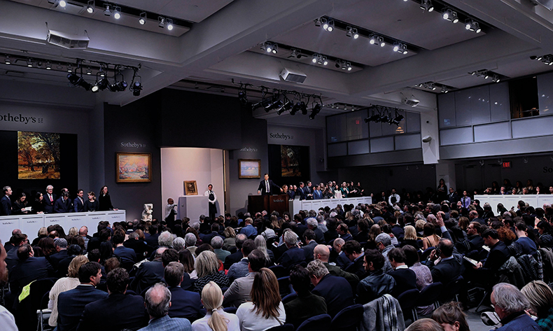 Bids are placed on a Vincent Van Gogh painting at Sotheby's New York In 2019. Photo: Johannes Eisele/AFP via Getty Images