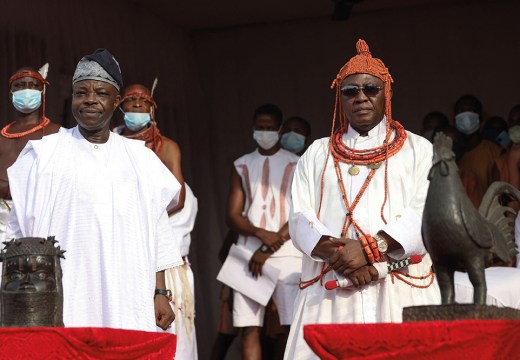 Oba Ewuare II (right), receiving restituted Benin Bronzes from Aberdeen and Cambridge universities in a ceremony in February 2022.