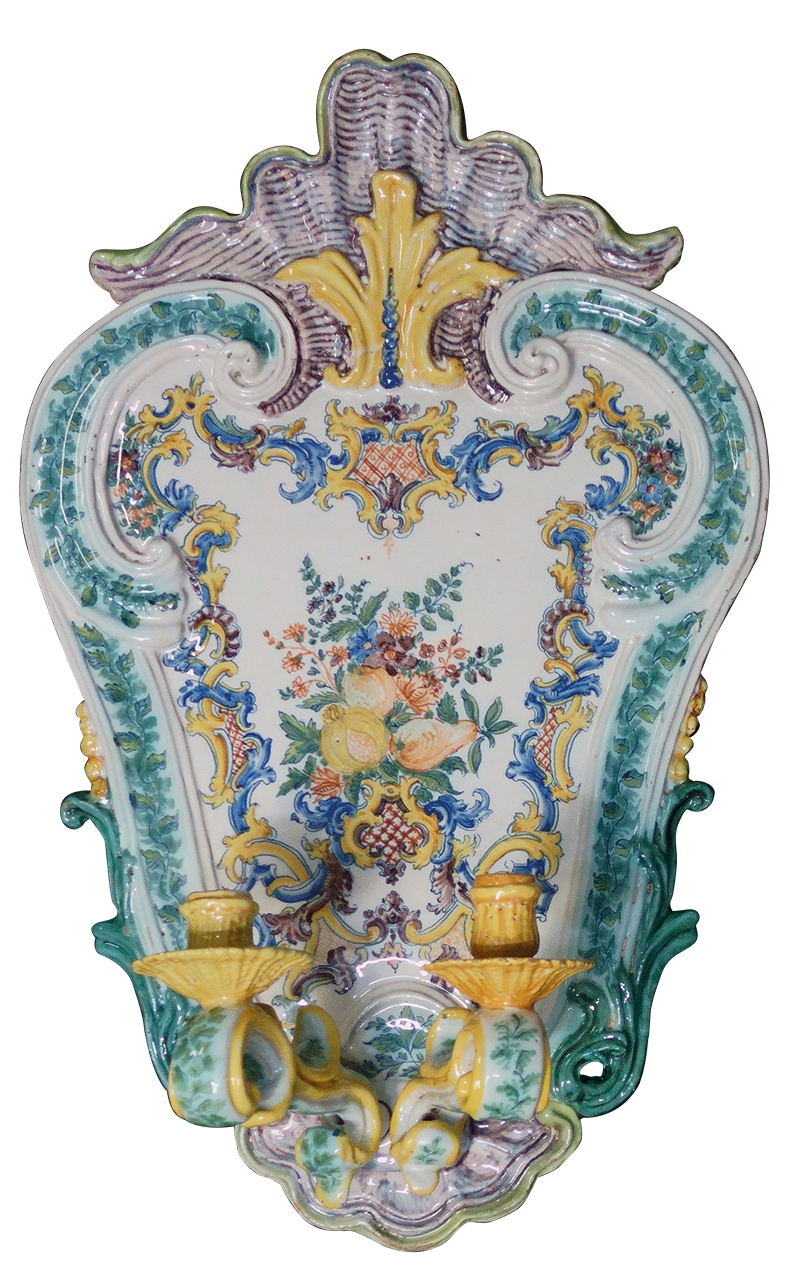 A pair of Italian late baroque maiolica appliqués