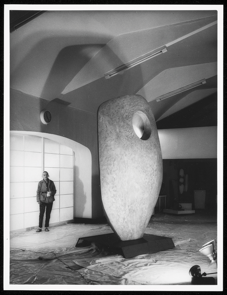 Photograph of Barbara Hepworth with the prototype for Single Form (Memorial)