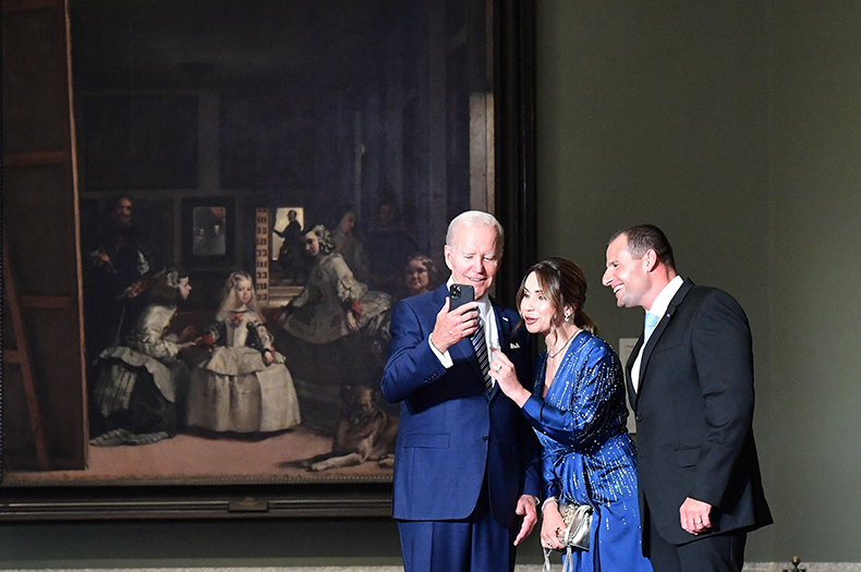 Joe Biden snaps a selfie in front of Las Meninas with Maltese Prime Minister Robert Abela and his wife Lydia Abela before a dinner for NATO leaders at the Prado on 29 June, 2022.
