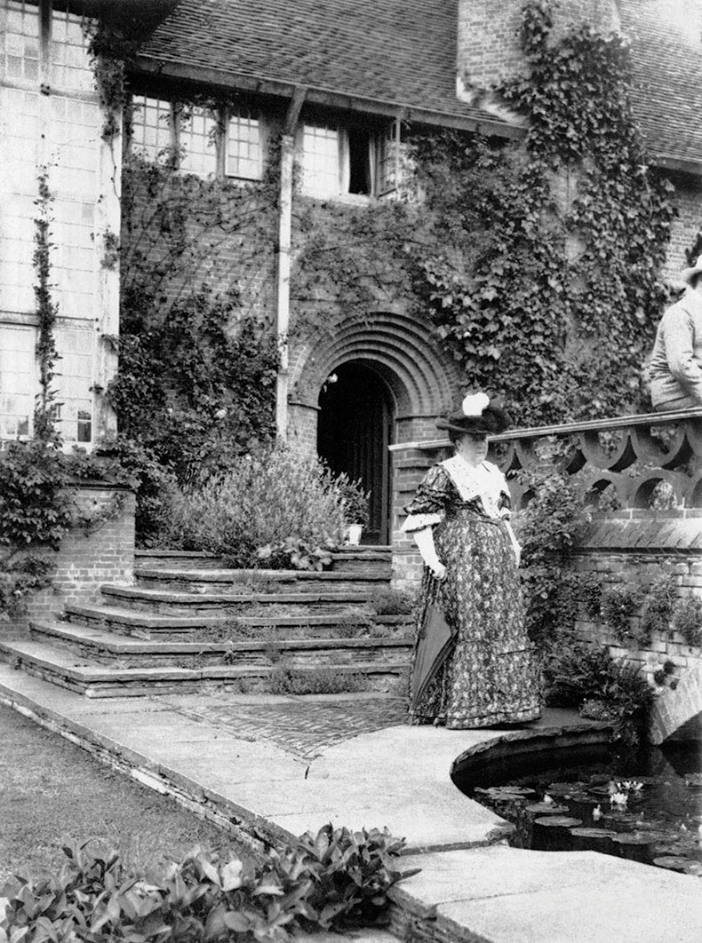 Gertrude Jekyll beside the terrace bridge at Deanery Garden, Sonning, Berkshire