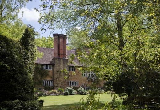 The view of Munstead Wood house across the west lawn.